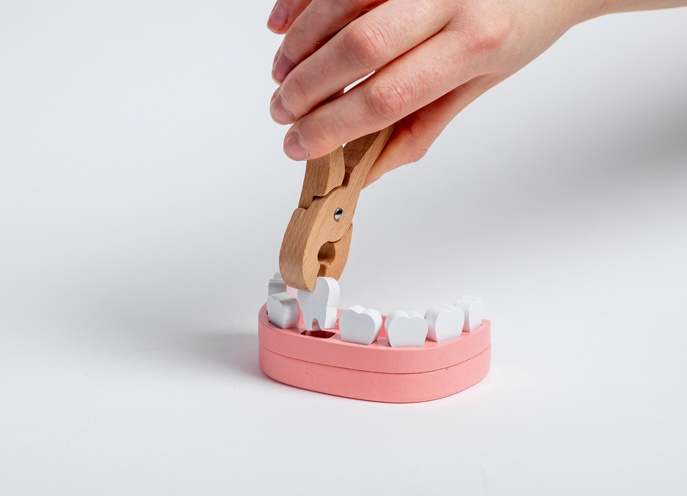 How long after tooth extraction can I get an implant